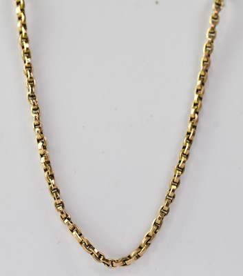 Lot 1211 - A 9ct gold square curb link necklace with ring...