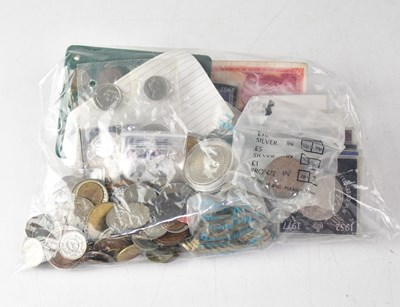 Lot 1046 - An album of mixed mostly UK coins, with some...