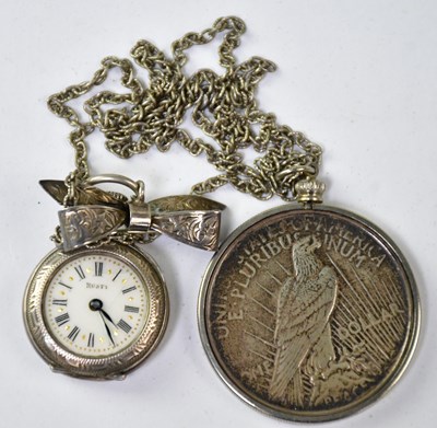 Lot 1226 - A 1922 USA silver 'Peace' dollar in pendant...