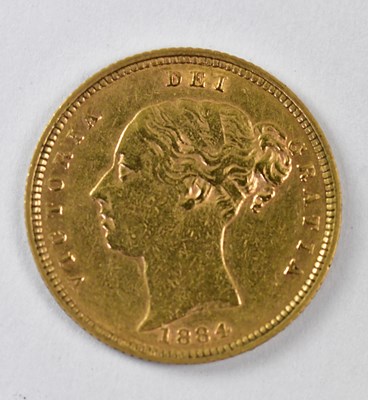 Lot 958 - A Victorian half sovereign 1884, young head...