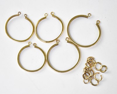 Lot 1239 - Five 9ct gold coin mounts and twelve gold cut...
