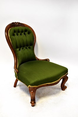 Lot 5 - A 19th century Victorian walnut balloon back nursing chair