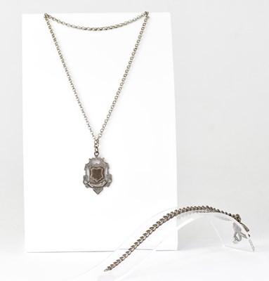 Lot 1206 - A belcher link chain with shield-shaped fob...
