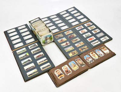 Lot 1833 - A collection of cigarette cards relating to...