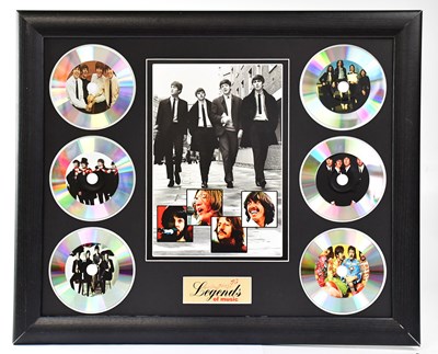 Lot 740 - A Beatles inspired montage featuring black and...