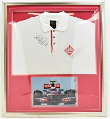 Lot 744 - JENSON BUTTON; a signed shirt from the Bahrain...