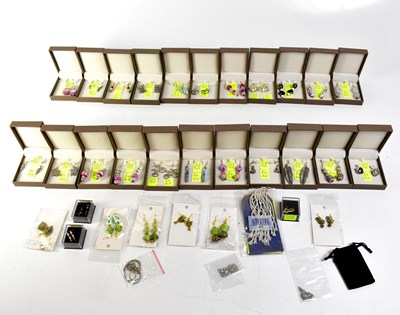 Lot 843 - A quantity of boxed and packaged drop earrings