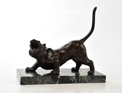 Lot 2713 - A Japanese bronze model of a stalking tiger,...