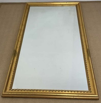 Lot 538 - A long mirror in a gilt frame, 182 x 82cm.