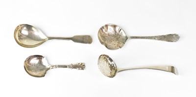Lot 922 - Three hallmarked silver caddy spoons and a...