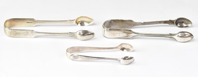 Lot 923 - Two similar pairs of hallmarked silver sugar...