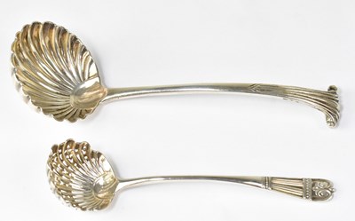 Lot 921 - A Victorian hallmarked silver ladle with shell-...