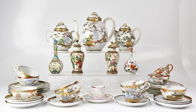 Lot 636 - A Japanese eggshell tea service, together with...