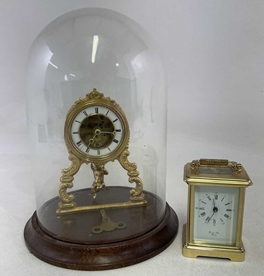Lot 425 - A late 19th century gilt metal cased timepiece...