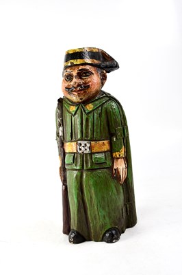 Lot 147 - A novelty carved wooden wine bottle holder