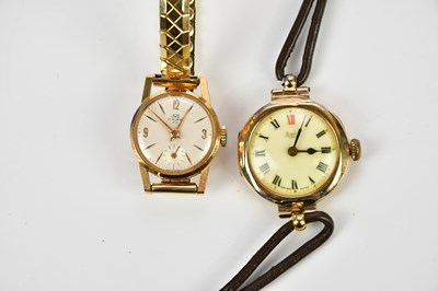 Lot 599 - UNO; an 18ct yellow gold lady's wristwatch on...