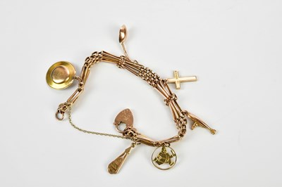Lot 415 - A 9ct yellow gold charm bracelet, approx 19.8g.