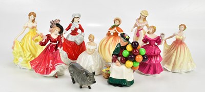 Lot 2826 - ROYAL DOULTON; a collection of nine figures,...