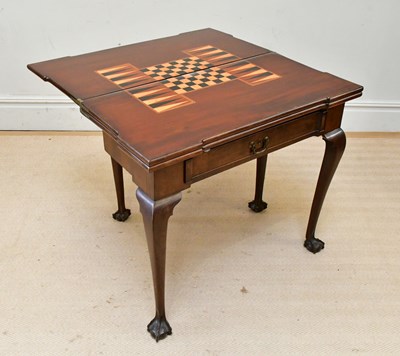 Lot 1000 - A good George III mahogany triple top games...