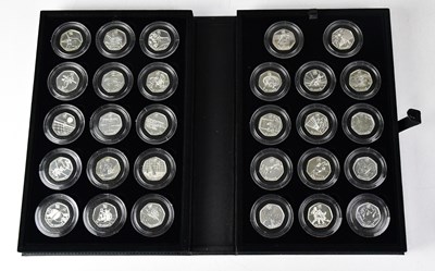 Lot 1015 - THE ROYAL MINT; a London 2012 silver 50p sport...