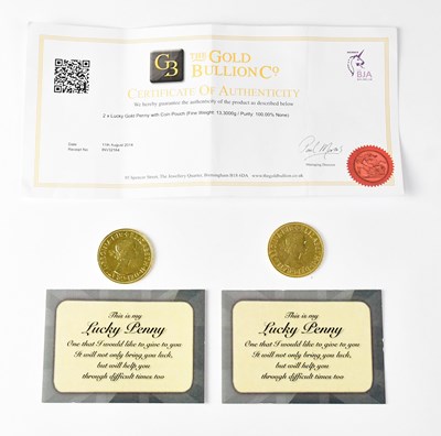 Lot 1038 - Two 24ct gold-plated one penny coins from 1964...