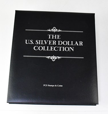 Lot 1002 - PCS STAMPS & COINS; 'The US Silver Dollar...