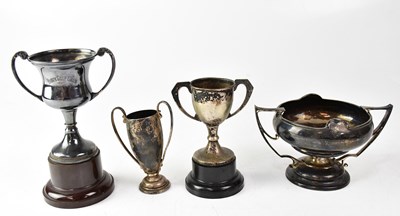 Lot 892 - Three hallmarked silver small trophies, height...