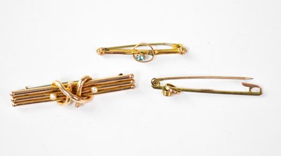 Lot 1176 - Three 9ct gold bar brooches, the smallest with...