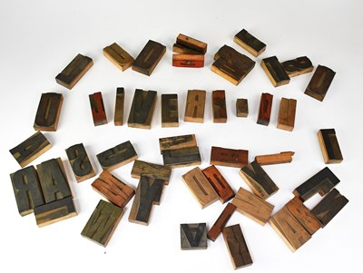 Lot 597 - A quantity of wooden printers' block letters...