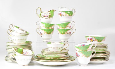 Lot 526 - A Jackson & Gosling porcelain part tea service...
