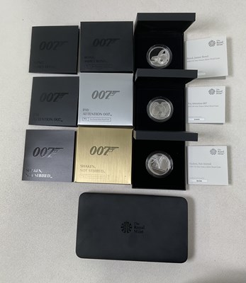 Lot 346 - ROYAL MINT; Three James Bond £2 silver proof...