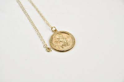 Lot 292 - A 9ct yellow gold St. Christopher pendant on...