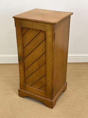 Lot 560 - A late 19th century oak bedside cupboard with...