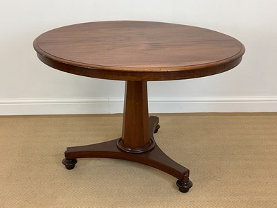 Lot 509 - A 19th century mahogany tilt top table over a...