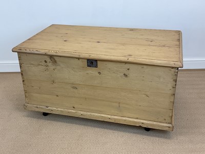 Lot 492 - A 20th century pine blanket box raised on...