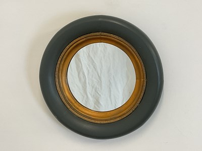 Lot 540 - A contemporary painted circular wall mirror,...