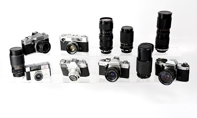 Lot 482 - A collection of film cameras and lenses.