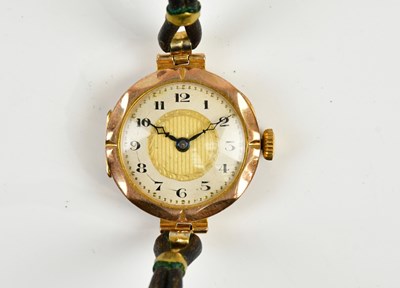 Lot 614 - An early 20th century 9ct gold lady's watch,...