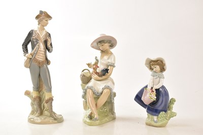 Lot 2845 - LLADRÓ; three boxed figures including a girl...