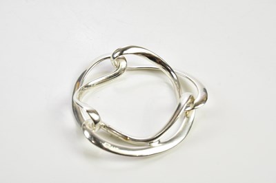 Lot 427 - GEORG JENSEN; a sterling silver openwork three...