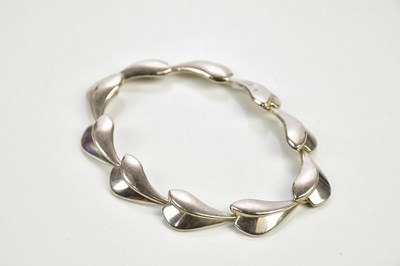 Lot 437 - GEORG JENSEN; a sterling silver bracelet...