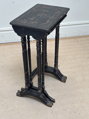 Lot 2704 - A nest of three Chinoiserie tables, with paw...