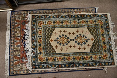 Lot 2287 - An Eastern style rug decorated with stylised...