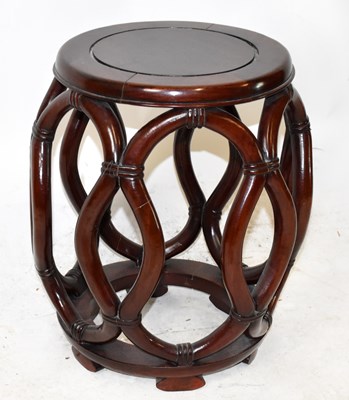 Lot 1588 - A Chinese rosewood garden seat, height 44cm,...