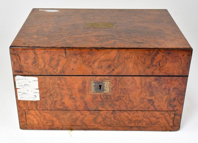 Lot 570 - A Victorian walnut cased vanity set with blue...