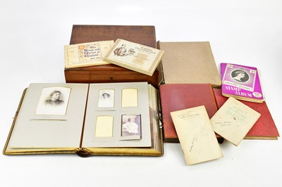 Lot 1822 - A walnut box containing Victorian leather...