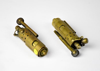 Lot 164 - Two early 20th century brass Trench Art style cigarette lighters