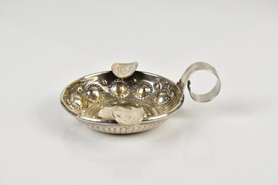 Lot 2156 - A Continental white metal wine taster, approx...