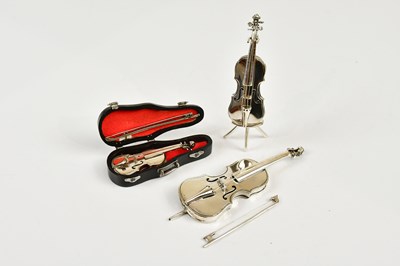 Lot 2467 - Two sterling violins, both stamped 925,...