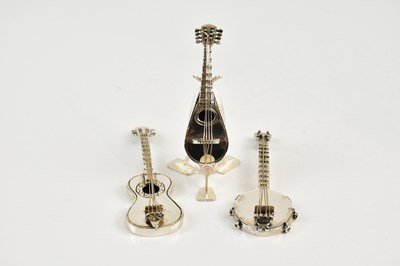 Lot 2468 - A small group of sterling silver novelty...